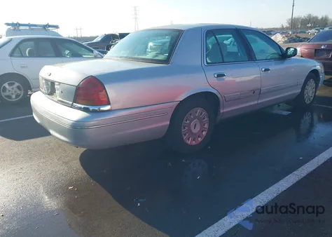 2003 Ford Crown Victoria Standard z USA, uszkodzony, nr VIN 2FAFP73W23X143591